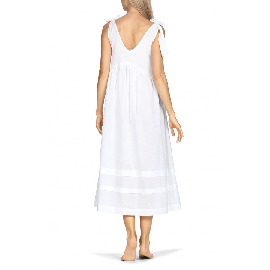 Long, white, loose-fitting sleeveless nightdress with shoulder ties.