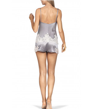 Two-piece nightset comprising a satin and lace strappy top and shorts.