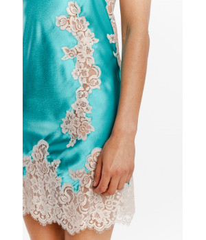 Pretty negligee with thin straps in bright turquoise satin and white lace
