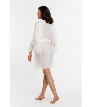 Floaty, pleated white dressing gown with lace trim on the flared sleeves