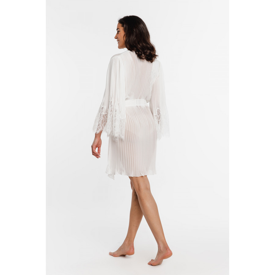 Floaty, pleated white dressing gown with lace trim on the flared sleeves
